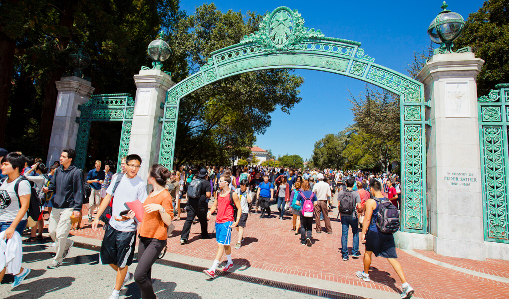Photo of students walking around Sather Gate at the UC Berkeley campus