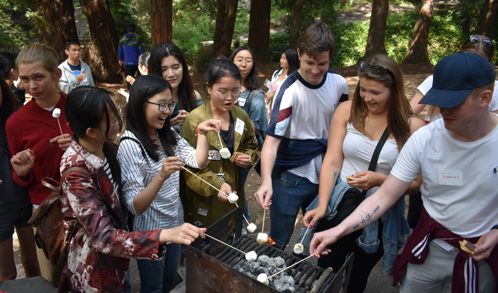 Photo of students making smores at the BISP BBQ at UC Berkeley