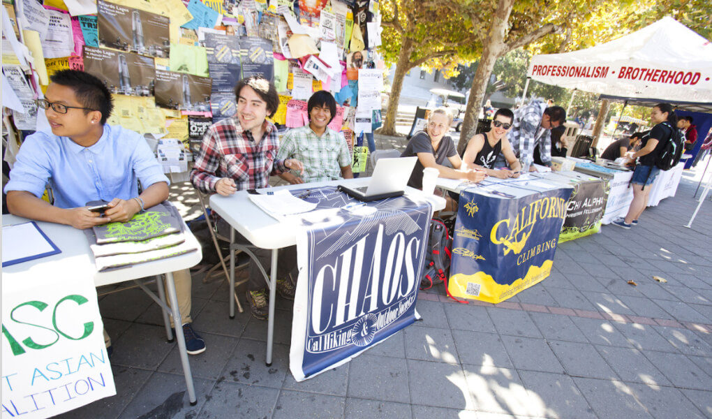 Photo of students at an event recruiting for various student organizations