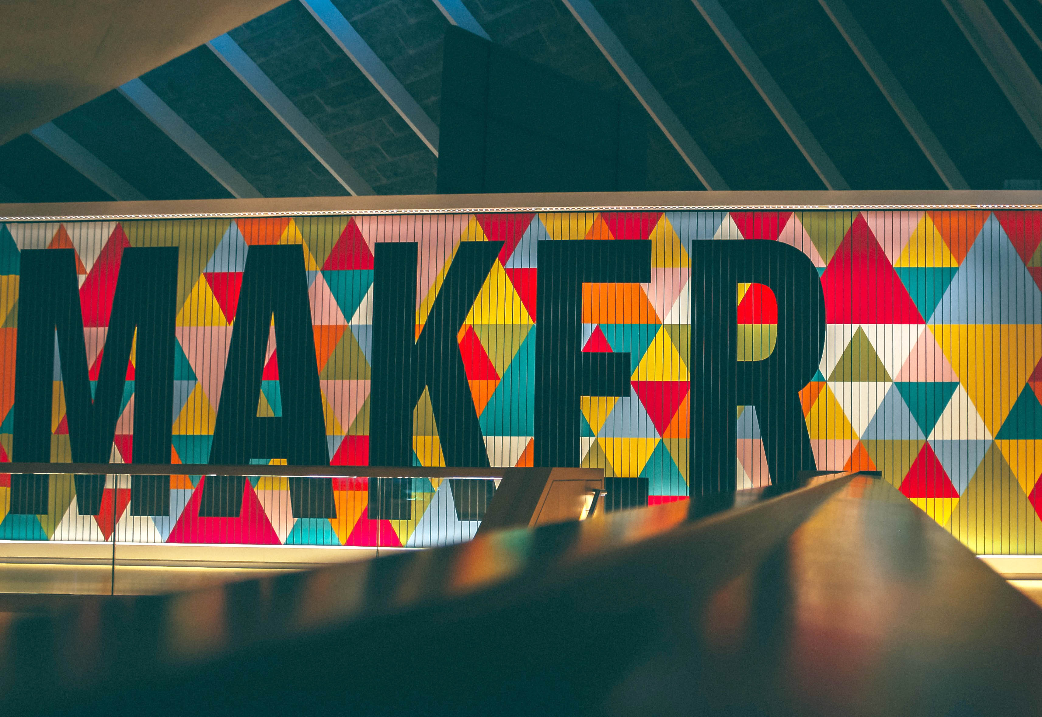 A virtual exhibit photo with the words "Maker"