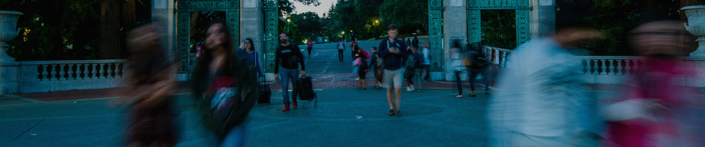 UC Berkeley students walking under Sather Gate
